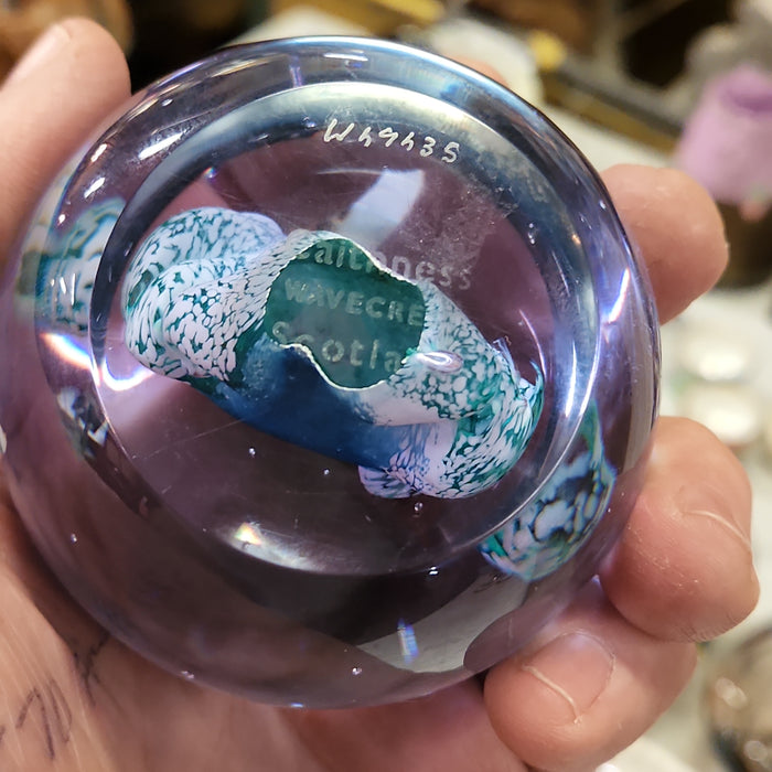 BLUE AND WHITE WAVE FORM PAPERWEIGHT