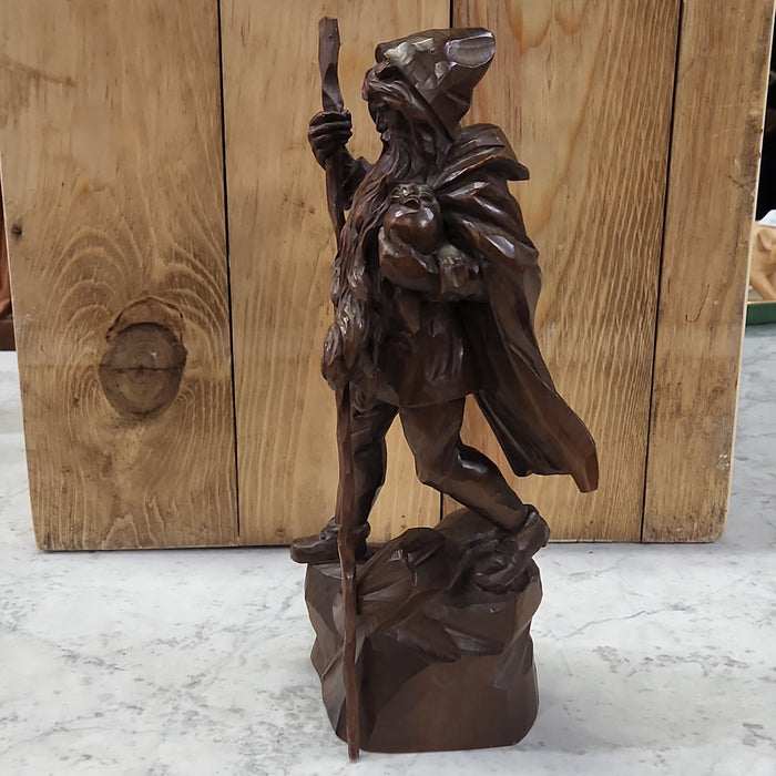 WOOD CARVING OF SOJOURNER WITH STAFF