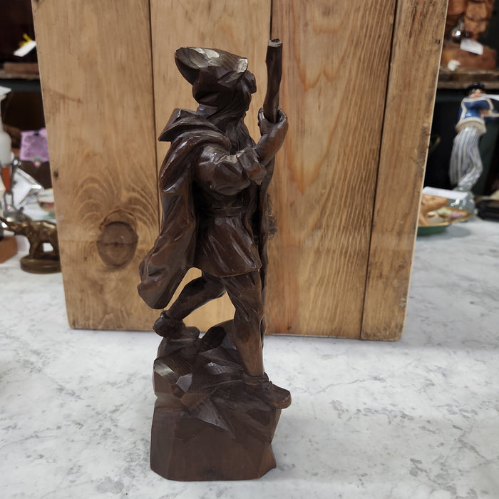 WOOD CARVING OF SOJOURNER WITH STAFF