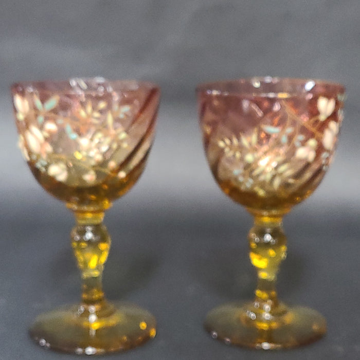 PAIR OF AMBERINA GLASS ENAMELED CORDIALS