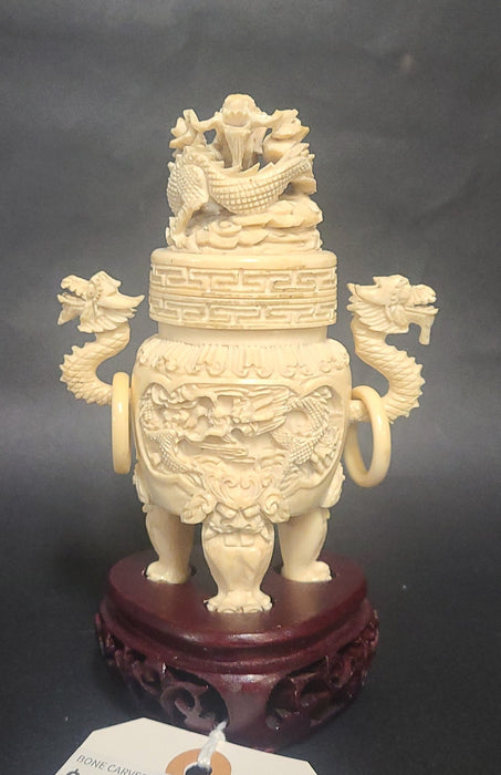 BONE CARVED ASIAN URN WITH WOOD BASE