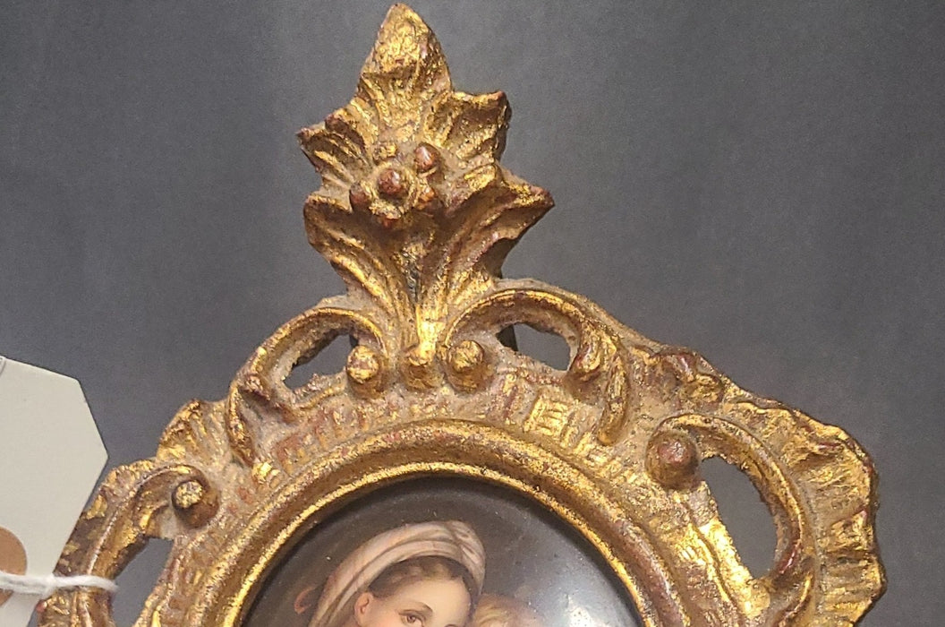 SMALL PORCELAIN MADONNA AND CHILD PAINTING IN ORNATE GOLD FRAME