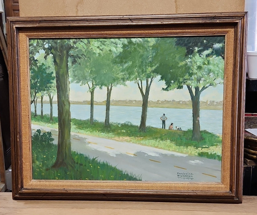 FRAMED OIL PAINTING OF A FAMILY BY A RIVER SIGNED FREDRICK BLAKESLEE 1972