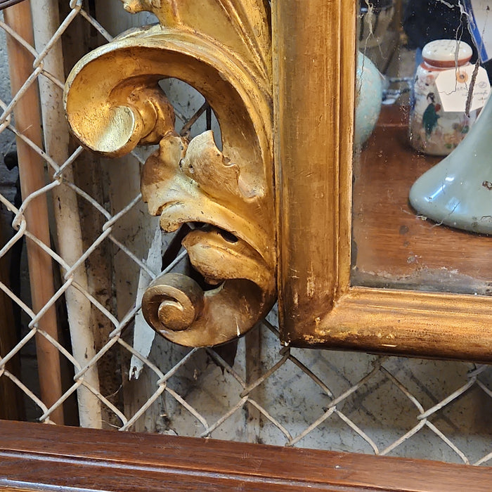 LARGE 19TH CENTURY GILT GESSO AND WOOD MIRROR WITH GRIFFINS AND MASK PEDIMENT