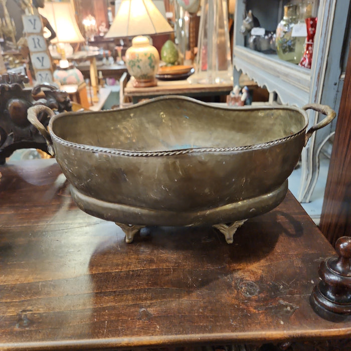 SMALL SHAPED FOOTED BRASS PLANTER