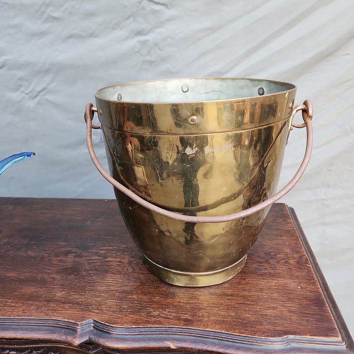 LARGE ROUND TAPERED BRASS POT WITH IRON HANDLE