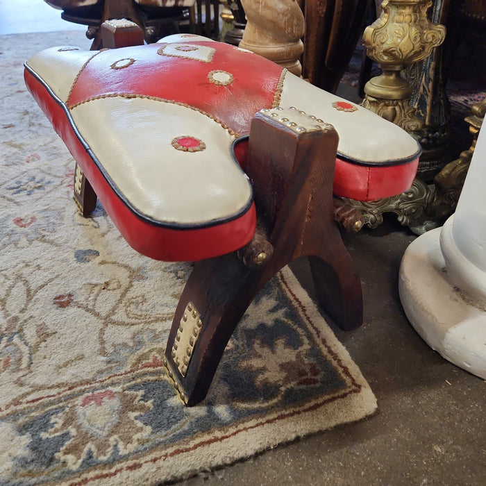 CAMEL STOOL WITH RED AND WHITE CUSHION