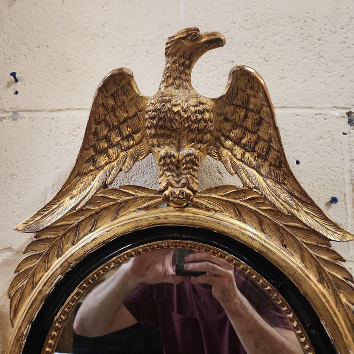 GILTWOOD OVAL CARVED EAGLE MIRROR WITH BLACK FILET
