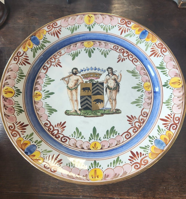 LARGE FAIENCE CHARGER WITH CREST AND LUSTER TRIM