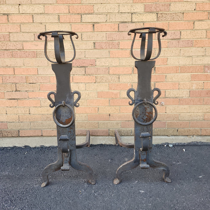 PAIR OF TALL BLACK FLAT IRON ANDIRONS WITH RINGS AND BASKET TOPS