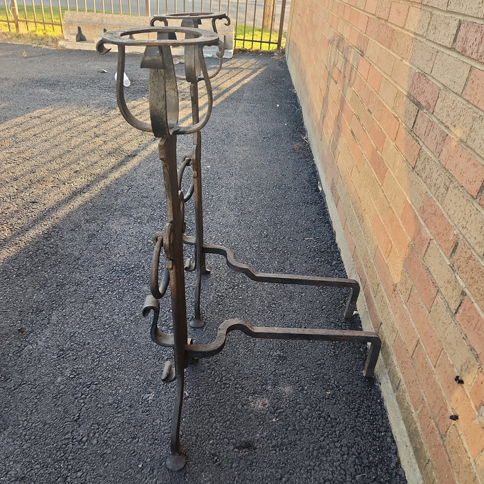 PAIR OF TALL BLACK FLAT IRON ANDIRONS WITH RINGS AND BASKET TOPS