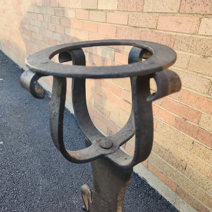 PAIR OF TALL BLACK FLAT IRON ANDIRONS WITH RINGS AND BASKET TOPS