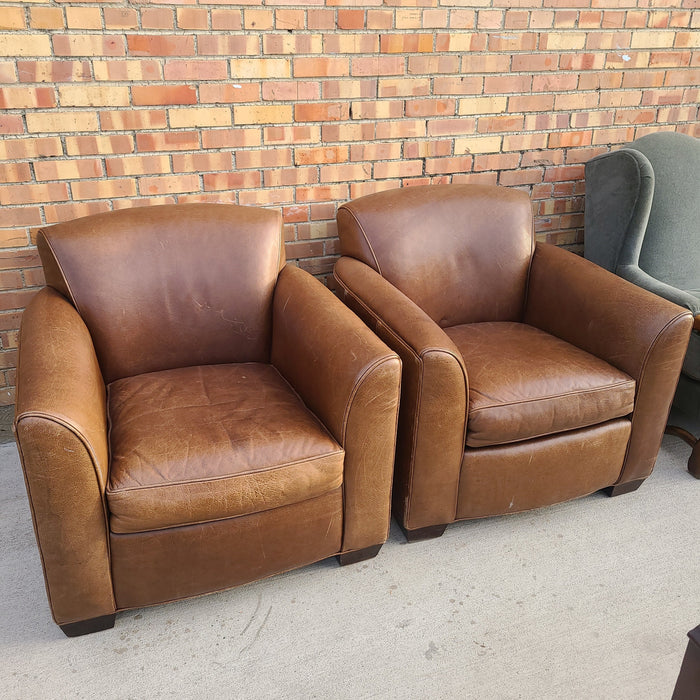 PAIR OF LEATHER ARM CHAIRS