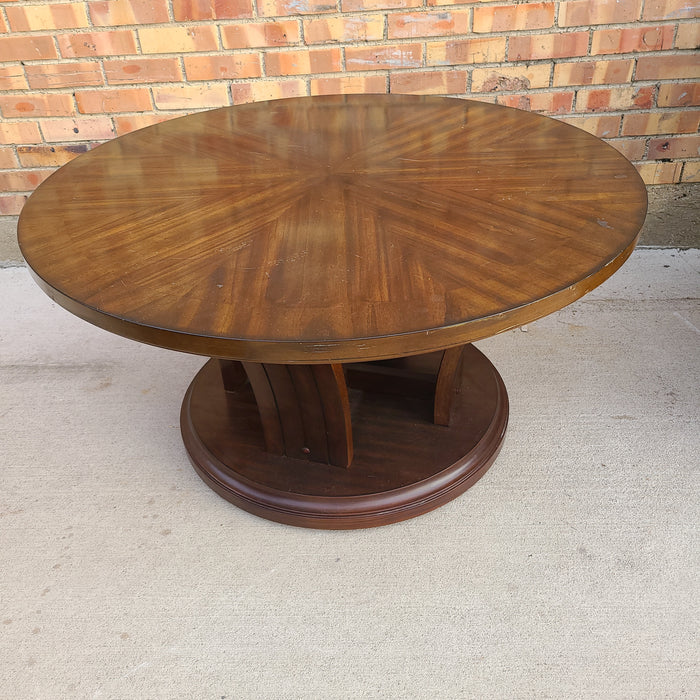 ROUND MODERN COFFEE TABLE WITH BOOKMATCHED TOP