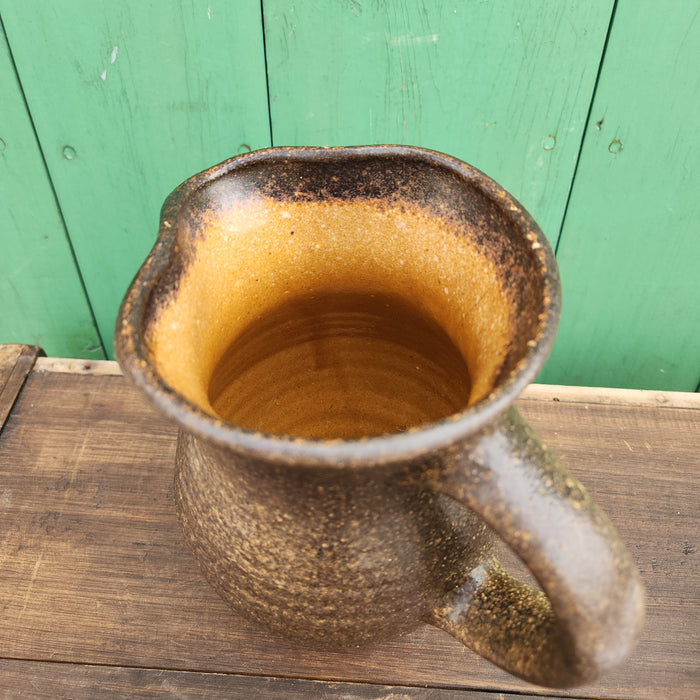 HAND THROWN BROWN RIBBED POTTERY PITCHER