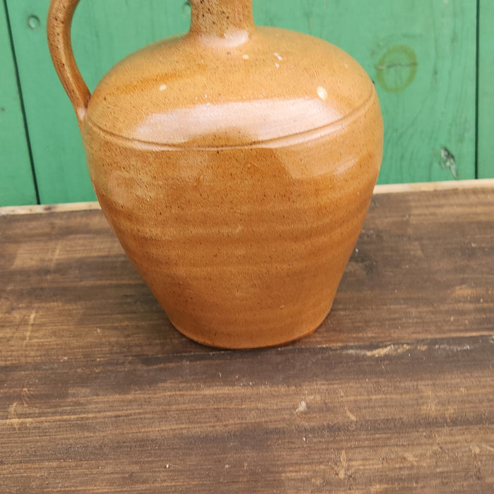 HAND THROWN BROWN GLAZED POTTERY JUG WITH HANDLE