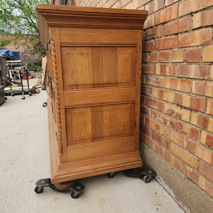 OAK SIDE BOARD WITH LINEN FOLD AND IRON HINGES