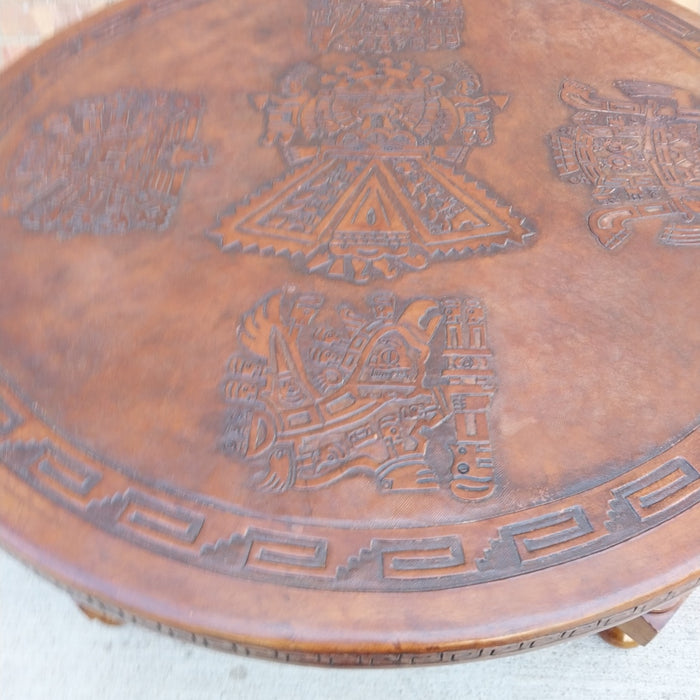 ROUND COFFEE TABLE WITH EMBOSSED LEATHER TOP