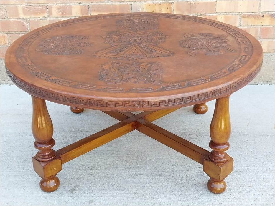 ROUND COFFEE TABLE WITH EMBOSSED LEATHER TOP