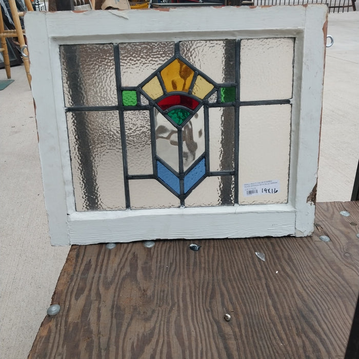 SMALL MULTI COLOR STAINED GLASS WINDOW WITH BLUE ARROW