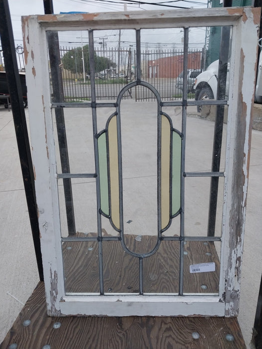 LARGE STAINED GLASS WINDOW WITH CLEAR CENTER OVAL