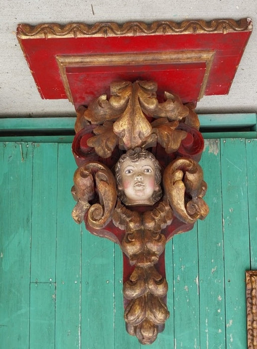 EARLY PAIR OF TALL POLYCHROME CARVED WOOD CHERUB WALL SCONCES