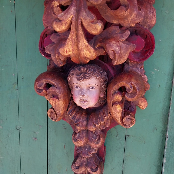 EARLY PAIR OF TALL POLYCHROME CARVED WOOD CHERUB WALL SCONCES