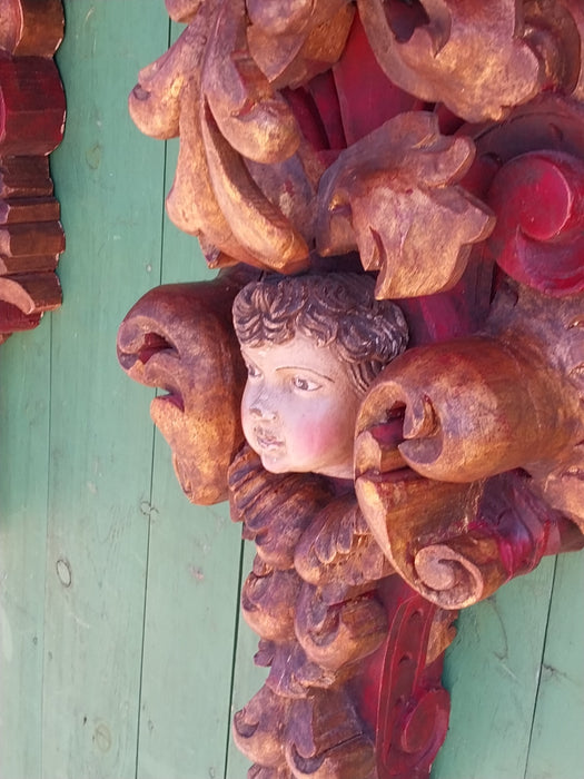 EARLY PAIR OF TALL POLYCHROME CARVED WOOD CHERUB WALL SCONCES