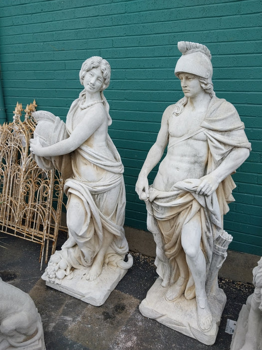 PAIR OF CONCRETE ROMAN SOLDIER STATUES-MAN AND WOMAN
