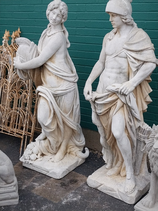 PAIR OF CONCRETE ROMAN SOLDIER STATUES-MAN AND WOMAN