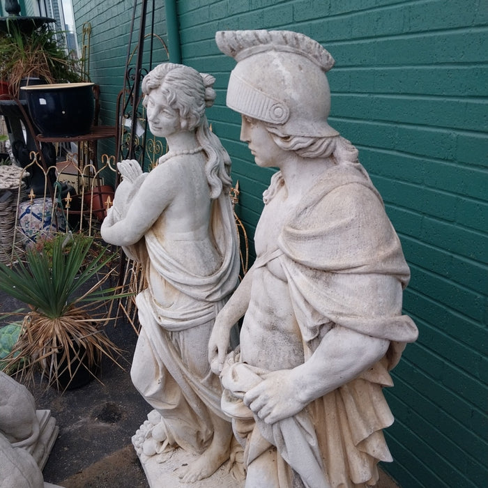 PAIR OF CONCRETE ROMAN SOLDIER STATUES-MAN AND WOMAN