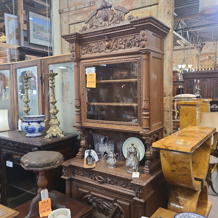 NARROW OAK HUNTBOARD WITH BIRD AND GRIFFINS