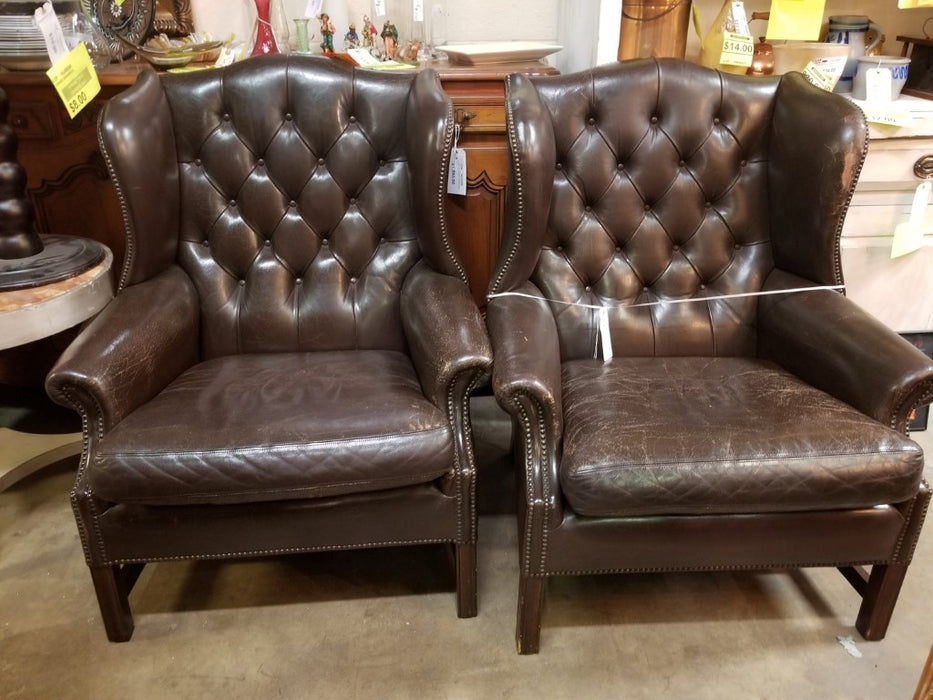 Pair of Brown tufted leather Wngback Chairs
