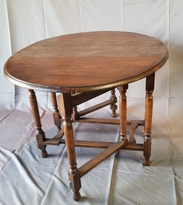 OAK DROPLEAF TABLE WITH BLOCK TURNED LEGS