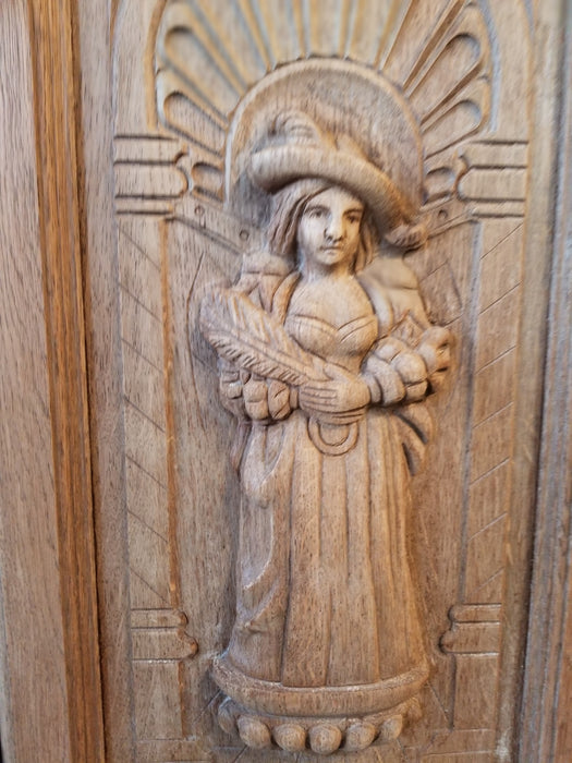 PAIR OF FIGURAL CARVED FRENCH RAW OAK CABINET DOORS