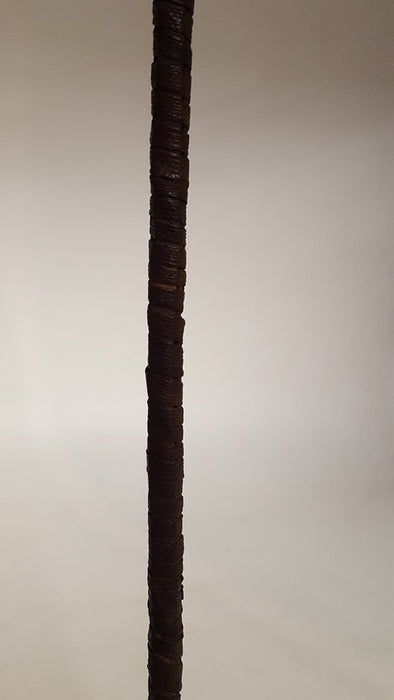 AFRICAN AXE WITH BLACK LEATHER HANDLE ON STAND