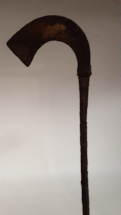AFRICAN AXE WITH BLACK LEATHER HANDLE ON STAND