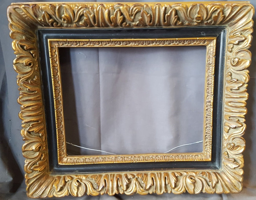 PAIR OF GOLD AND BLACK WOOD AND COMPOSITION FRAMES