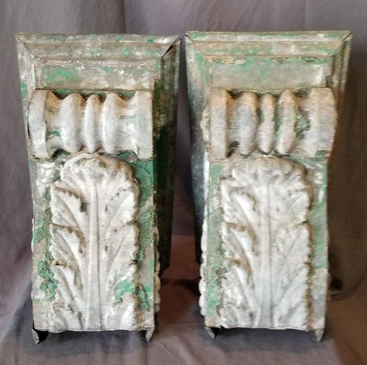 PAIR OF ZINC PAINTED GREEN AND WHITE CORBELS