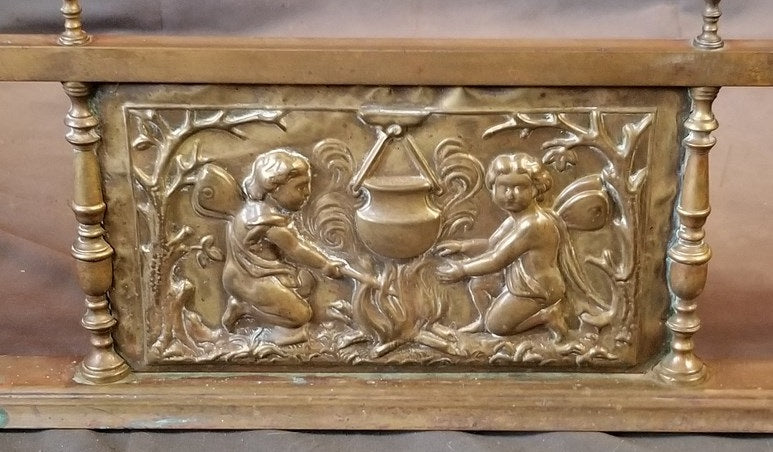 LARGE  FANCY BRASS FIRE SURROUND WITH EMBOSSED CHERUBS