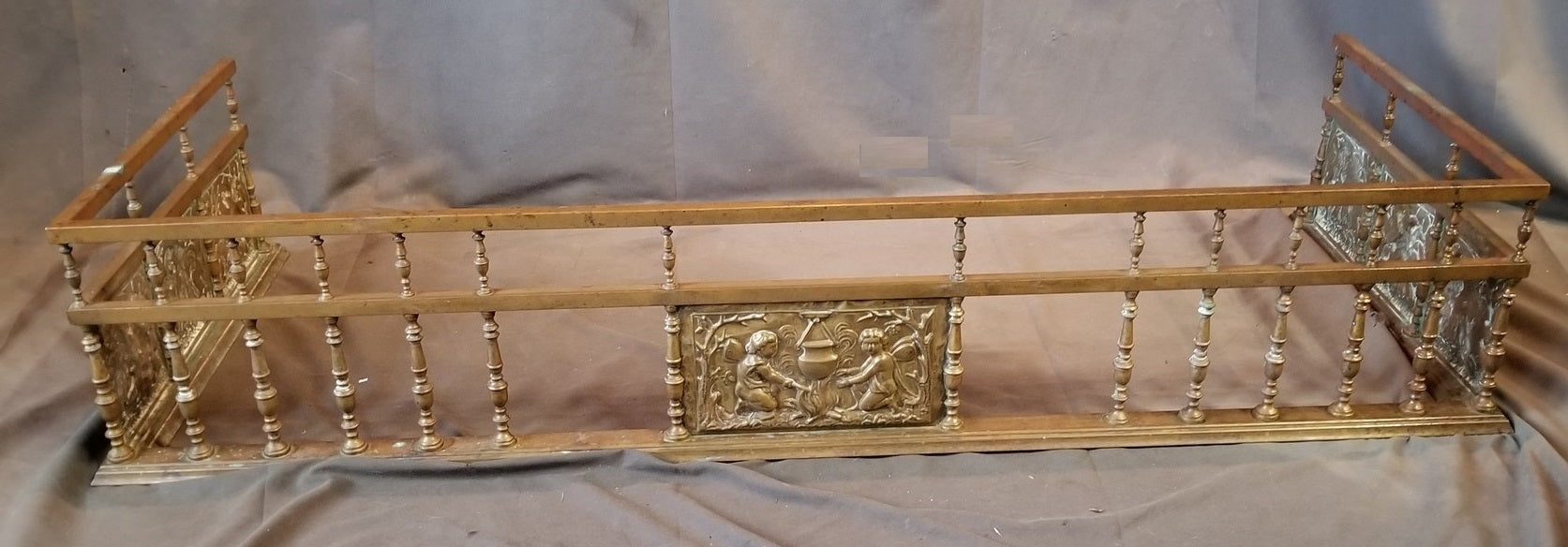 LARGE  FANCY BRASS FIRE SURROUND WITH EMBOSSED CHERUBS