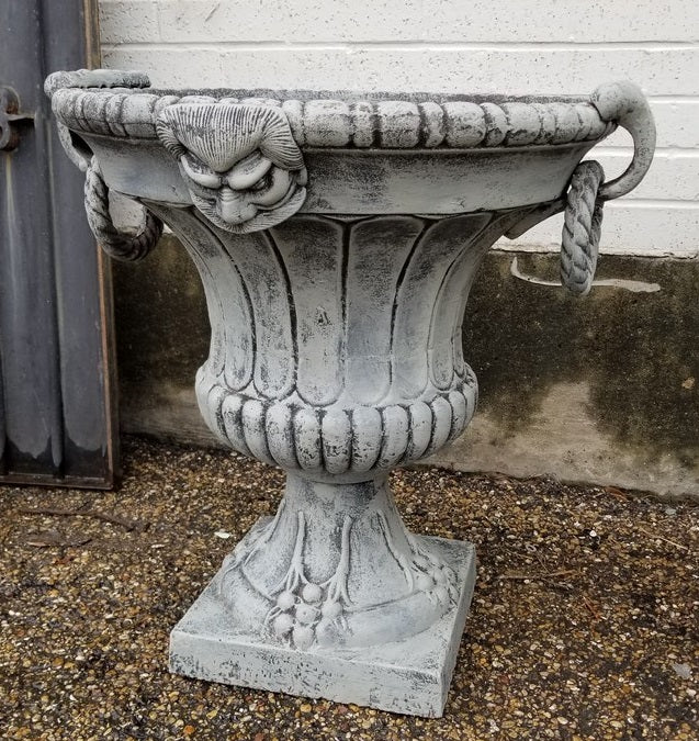 PAIR OF LARGE CAST IRON URNS