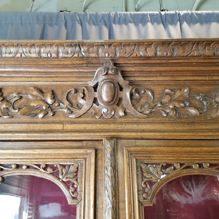 LOUIS XIII OAK BOOKCASE WITH BARLEY TWIST AND LION FACE DOORS