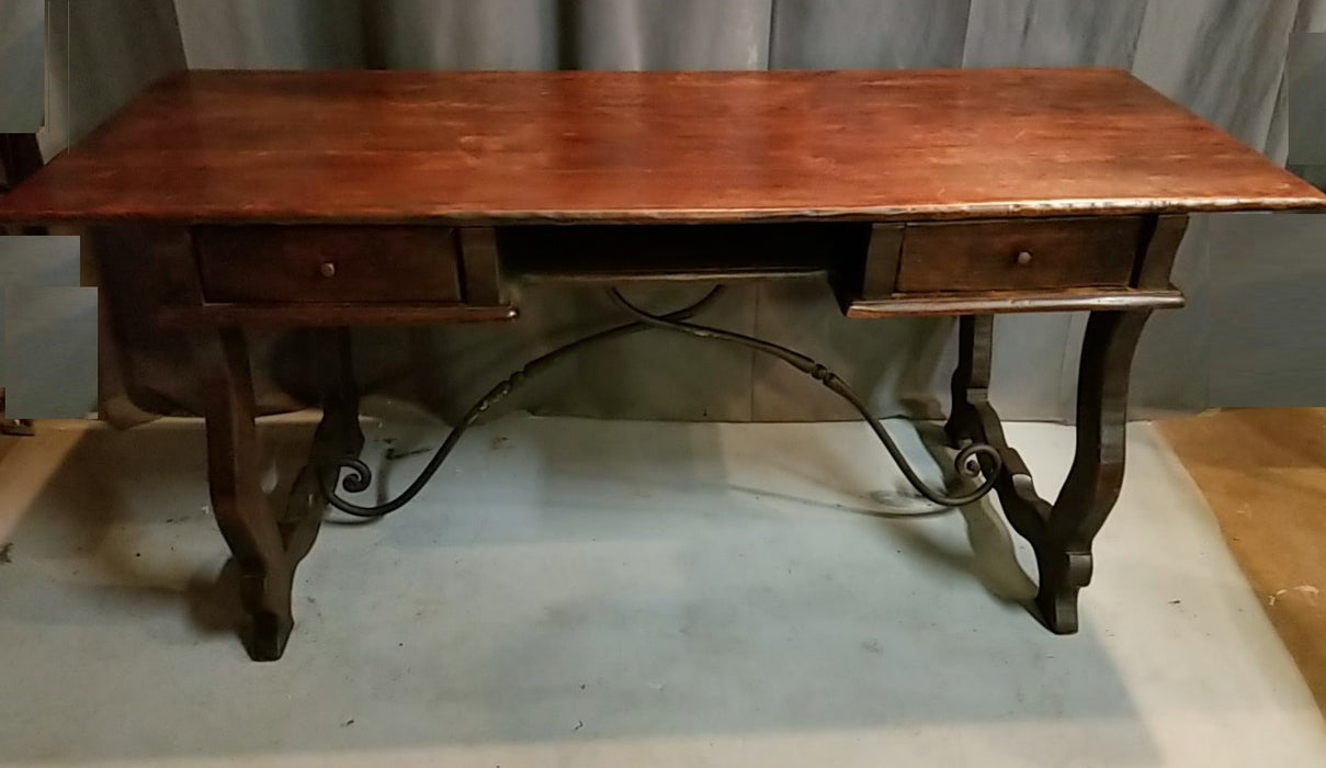 SPANISH OAK DESK WITH IRON STRETCHER AND 2 DRAWERS