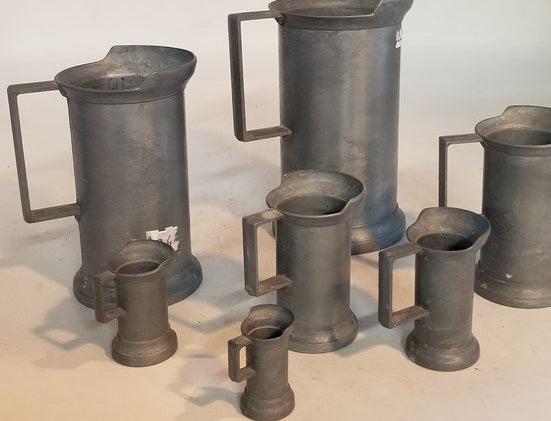 SET OF 7 GRADUATED PEWTER MEASURES