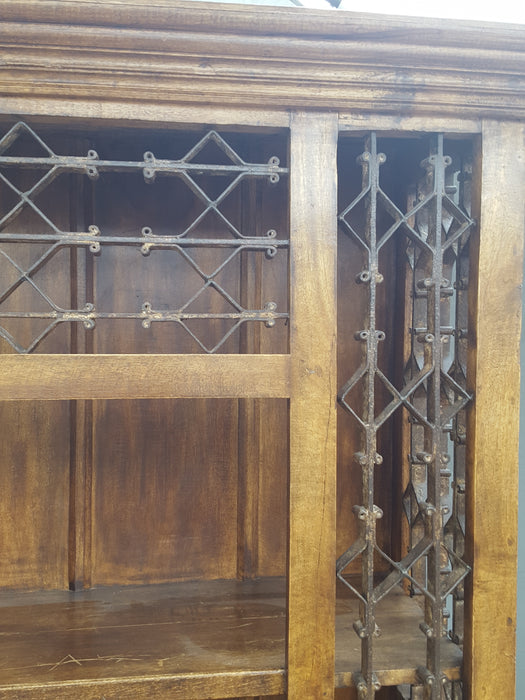 LARGE INDIAN BOOKCASE WITH GREAT IRON EMBELLISHMENTS