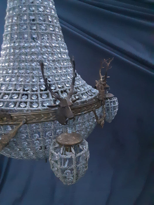 EMPIRE STYLE PRISM CHANDELIER WITH ELKS HEADS AND BEADED HANGING GLOBES