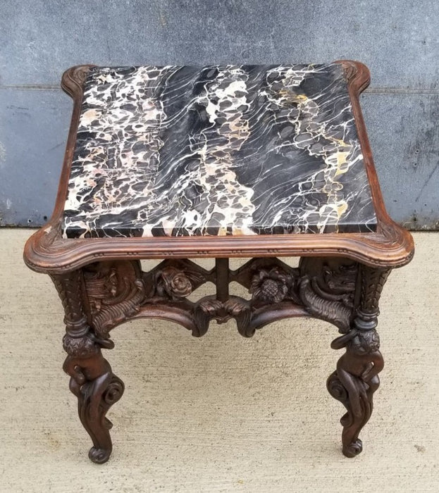 CARVED PUTTI LAMP TABLE WITH MARBLE TOP