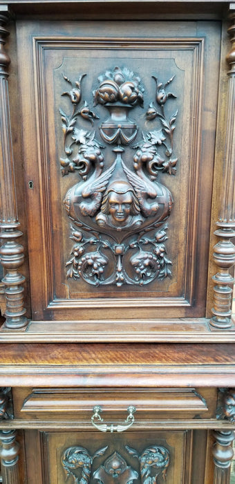 LARGE CARVED WALNUT BUFFET WITH COLUMNS AND LIONS AND SWAGS