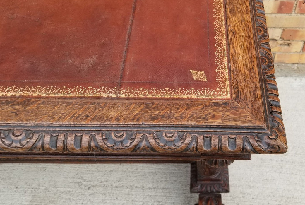 FRENCH FIGURAL CARVED COLUMNAR OAK 19TH CENTURY LIBRARY TABLE WITH LEATHER TOP